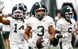 Michigan State's Rodney Bullard Jr. carries the ball while moving to the next drill during spring football practice on Tuesday, April 14, 2026, in East Lansing. - Nick King, USA TODAY Sports