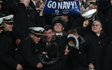 Navy celebrates their lead in the second half as Navy defeated Army 17-13 at MetLife Stadium in East Rutherford, NJ on December