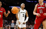 2026-03-28T190657Z_361522011_MT1USATODAY28606493_RTRMADP_3_NCAA-WOMENS-BASKETBALL-NCAA-TOURNAMENT-FORT-WORTH-REGIONAL-LOUISVILLE-AT-MICHIGAN
