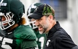 Michigan State's defensive coordinator Joe Rossi encourages players during a drill at spring football practice on Tuesday, April 14, 2026, in East Lansing. - Nick King, USA TODAY Sports