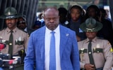Memphis head coach Charles Huff walks towards Simmons Bank Liberty Stadium during Tiger Walk before the home opener between
