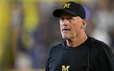 Sep 5, 2026; Ann Arbor, Michigan, USA; Michigan head coach Kyle Whittingham looks at the scoreboard during a break in the action against Western Michigan in the second quarter at Michigan Stadium. Mandatory Credit: Lon Horwedel-Imagn Images