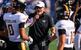 Sep 5, 2026; Annapolis, Maryland, USA; Towson Tigers head coach Pete Shinnick reacts while speaking with his team during the first half against the Navy Midshipmen at Navy-Marine Corps Memorial Stadium. Mandatory Credit: Tommy Gilligan-Imagn Images