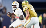 Tennessee quarterback Faizon Brandon (11) runs while defended during a college football game between Tennessee and Georgia Tech at Bobby Dodd Stadium in Atlanta, Ga., on Sept. 12, 2026.