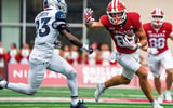 Indiana's Charlie Becker (80) scores a touchdown during the Indiana versus Howard football game at Memorial Stadium on Saturday,