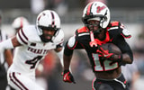 Oregon State's Jesse Legree runs into the end zone for a touchdown during an NCAA football game at Reser Stadium on Saturday,