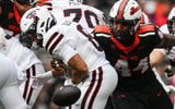 Oregon State's Takari Hickle, right, knocks the ball away from Texas Tech's Cameron Dickey during an NCAA football game at Reser