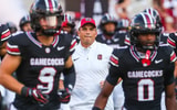 Shane Beamer runs out with the team ahead of their 2026 matchup against Towson. Photo by: Katie Dugan | GamecockCentral