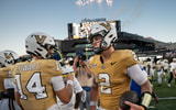 Vanderbilt quarterback Jared Curtis (2) celebrates with quarterback Drew Cowart (14) after defeating Delaware at FirstBank