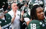 Michigan State Spartans head coach Pat Fitzgerald sings the fight song with his team after their win over Eastern Michigan at Spartan Stadium. - Dale Young, USA TODAY Sports