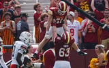 Iowa State's Aiden Flora (21) celebrates with Braden Smith (63) after scoring a touchdown against Bowling Green during the first