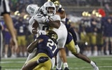 edwards tackled Michael Caterina
