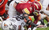 Iowa State defensive end Blake Hawkins (91) tackles Bowling Green Falcons running back Marceles Carey (20) during the fourth