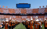 Two E/18 Growlers from Naval Air Station at Whidbey Island, Washington fly over the singing of the National Anthem in a checkered Neyland Stadium at the NCAA college football game between Tennessee and Georgia on September 13, 2025, Knoxville, Tennessee.