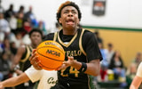 Villiages Charter guard Aaron Britt (24) shoots during a high school basketball game against Trinity Catholic at Trinity