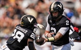 Vanderbilt quarterback Jared Curtis (2) hands off to running back Sedrick Alexander (28) during the first quarter against NC