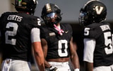 Vanderbilt wide receiver Junior Sherrill (0) celebrates his touchdown against NC State with quarterback Jared Curtis (2) and