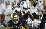 Notre Dame Fighting Irish running back Nolan James Jr. (2) runs against Michigan State Spartans cornerback Tyran Chappell (22) during the first half at Notre Dame Stadium. - Michael Caterina, USA TODAY Sports