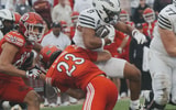 Iowa State running back Cameron Pettaway (0) is tackled by Utah safety Jackson Bennee (23) during the third quarter on Sept. 26,