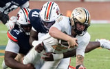 Vanderbilt Commodores quarterback Jared Curtis (2) is tackled by Auburn Tigers edge Jared Smith (41) as Auburn Tigers take on