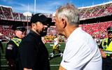 Ohio State head coach Ryan Day, left, shakes hands with Iowa head coach Kirk Ferentz after a NCAA football game, Saturday, Oct.