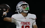Fishers Roman Wessell (10) with the pass attempt as the Carmel Greyhounds took on the Fishers Tigers in IHSAA football, Aug 21,