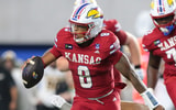 Kansas Jayhawks quarterback Isaiah Marshall (8)  runs the ball against Missouri Tigers during the game inside David Booth Kansas