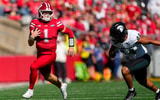 Oct 3, 2026; Madison, Wisconsin, USA; Wisconsin Badgers quarterback Colton Joseph (1) rushes with the football in front of Michigan State Spartans linebacker Caleb Wheatland (44) during the first quarter at Camp Randall Stadium. (Photo Credit: Jeff Hanisch-Imagn Images)