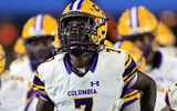 Columbia's Kyren Caldwell (7) leads the team onto the field before a high school football game Friday, Oct. 4, 2024 at The