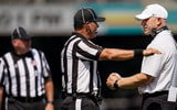 Vanderbilt coach Clark Lea speaks with officials during the second quarter against NC State at FirstBank Stadium in Nashville,
