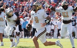 Vanderbilt Commodores quarterback Jared Curtis (2) runs the ball as Auburn Tigers take on Vanderbilt Commodores at Jordan-Hare