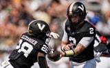 Vanderbilt quarterback Jared Curtis (2) hands off to running back Sedrick Alexander (28) during the first quarter against NC