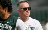 Michigan State’s head coach Pat Fitzgerald looks on as the team warms up before the game against Illinois on Saturday, Oct. 10, 2026, at Spartan Stadium in East Lansing. (Nick King/Lansing State Journal / USA TODAY NETWORK via Imagn Images)