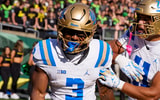 UCLA running back Wayne Knight, left, and UCLA wide receiver Landon Ellis celebrate a touchdown by Knight as the Oregon Ducks