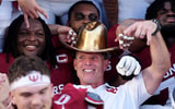Oklahoma head coach Brent Venables celebrates following the Red River Rivalry college football game between the University of