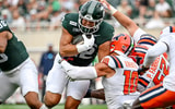 Michigan State’s Carson Gulker, center, runs for a gain against Illinois during the second quarter on Saturday, Oct. 10, 2026 (Nick King/Lansing State Journal / USA TODAY NETWORK via Imagn Images)