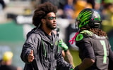 2026-10-10T215224Z_1637014867_MT1USATODAY30050333_RTRMADP_3_OREGON-QUARTERBACK-DANTE-MOORE-LEFT-GREETS-OREGON-WIDE (1)