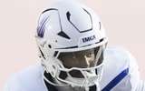 New Palestine Dragons Waynee Estes (25) attempts to tackle IMG Academy Ascenders Jayden Wade (7) as he runs the ball Friday,