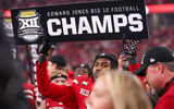 Texas Tech's Charles Esters III holds a sign after the Big 12 Conference championship football game, Saturday, Nov. 6, 2025, at