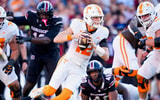 2026-10-24T211843Z_1656943455_MT1USATODAY30175231_RTRMADP_3_TENNESSEE-QUARTERBACK-GEORGE-MACINTYRE-12-ESCAPES-TACKLES