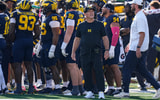 Michigan head coach Kyle Whittingham watches a replay against Indiana during the second half at Michigan Stadium in Ann Arbor on