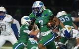 Green Bay Notre Dame's Kingston Allen (7) runs the ball during a WIAA Division 2 first-round playoff game against Germantown
