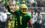 watch-noah-sewell-celebrates-with-mario-cristobal-after-oregon-stuns-ohio-state