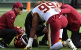 chase-young-washington-football-team-injures-leg-leaves-game-against-tampa-bay-buccaneers-ohio-state-buckeyes-terry-mclaurin