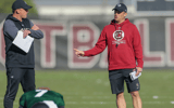 Offensive coordinator Marcus Satterfield chats with head coach Shane Beamer during South Carolina's first spring practice of 2022 (Photo: Chris Gillespie) 