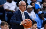 roy-williams-in-attendance-for-college-world-series-matchup-between-north-carolina-and-virginia