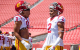 USC rush ends Korey Foreman and Romello Height talk during the Trojans' 2022 spring game at the Los Angeles Memorial Coliseum