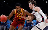 INDIANAPOLIS, INDIANA - MARCH 30: Evan Mobley #4 of the USC Trojans dribbles against Corey Kispert #24 of the Gonzaga Bulldogs during the second half in the Elite Eight round game of the 2021 NCAA Men's Basketball Tournament at Lucas Oil Stadium on March 