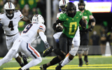 EUGENE, OR - SEPTEMBER 25: Oregon Ducks RB Seven McGee (0) runs after the catch against Arizona Wildcats S Gunner Maldonado (9) during a PAC-12 conference football game between the Oregon Ducks and Arizona Wildcats on September 25, 2021 at Autzen Stadium 