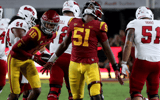 USC defensive end Solomon Byrd (51) celebrates after recovering a fumble by Fresno State quarterback Jake Haener. Byrd sacked Haener and forced the turnover in the third quarter at the Coliseum in Los Angeles. on Saturday night, Sep. 17, 2022. (Luis Sinco